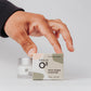 Hands reaching for micro-oxygen moisturizer face cream box